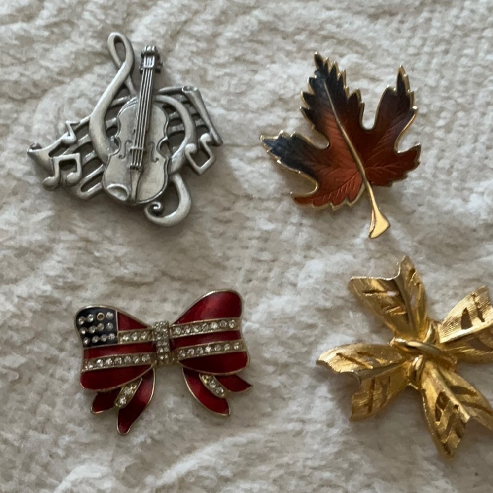 Set of Four Decorative Brooches